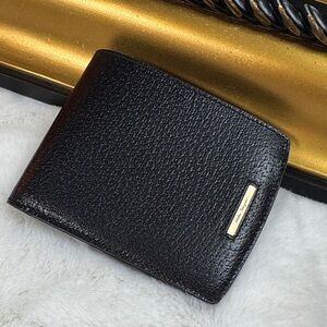 Salvatore Ferragamo Black Leather Bi-Fold Wallet with Gold Plaque
